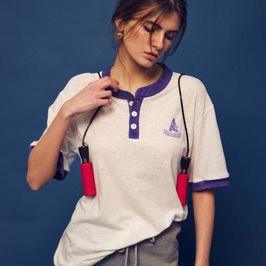 Embrace the 90s collegiate training aesthetic with the Ivy Archive Contrast Henley Tee. Featuring a classic 3-button placket, sporty ringer trims, and a comfortable relaxed fit for an effortless vintage look.
