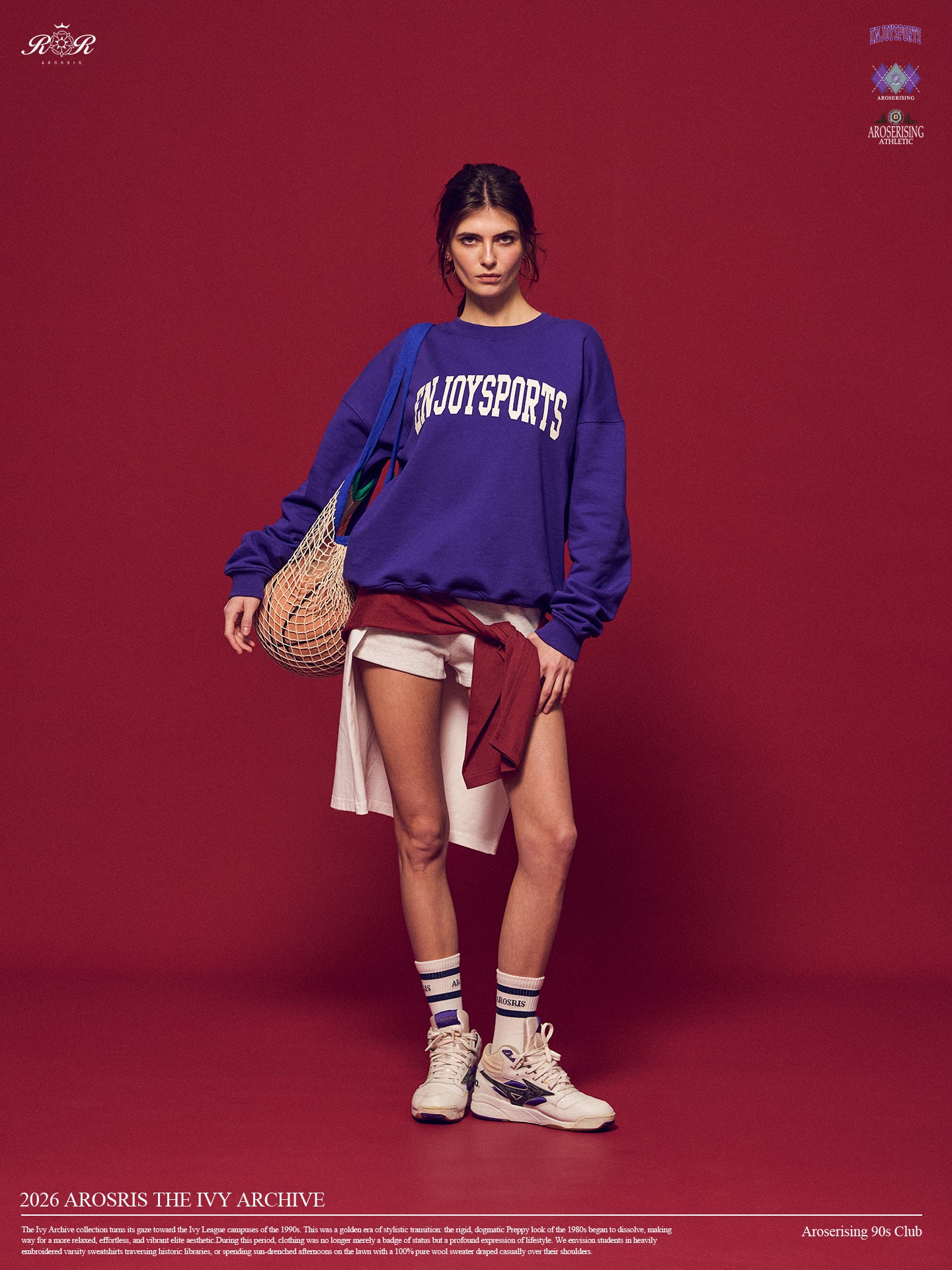 Arosris Ivy Archive Enjoy Sports crewneck sweatshirt in purple, styled with white shorts, sneakers, and a basketball for an effortless 90s off-duty street style look.
