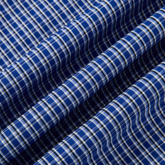 Arosris Ivy Archive oversized plaid shirt in blue, showing the collar design, button details, and 100% cotton fabric texture.
