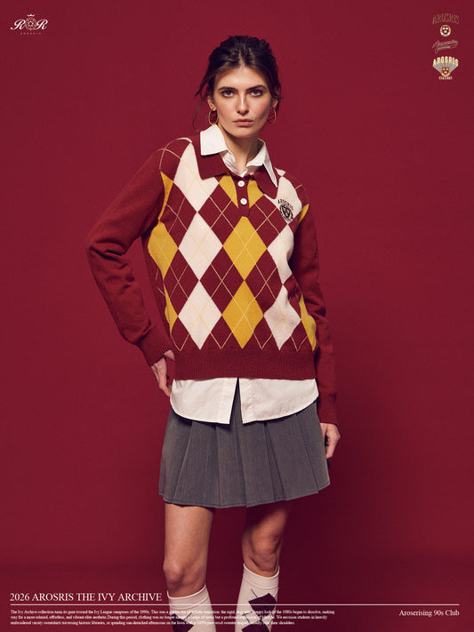 Arosris Ivy Archive pleated mini skirt in grey, styled with classic collegiate knitwear and shirting for an effortless 90s preppy look.