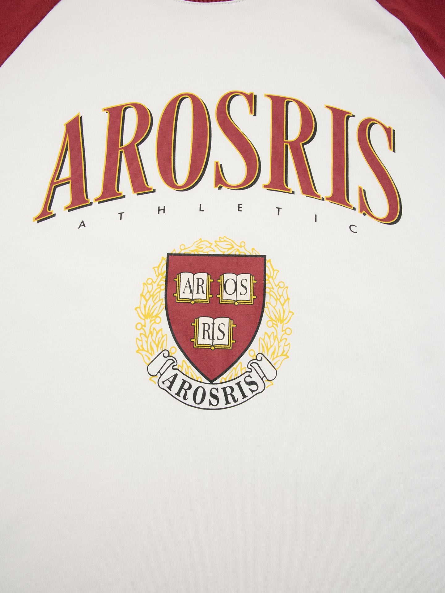 Arosris Ivy Archive collegiate raglan long sleeve in red, showing the vintage AROSRIS arch logo graphic, contrast raglan sleeves, and 100% cotton fabric texture.