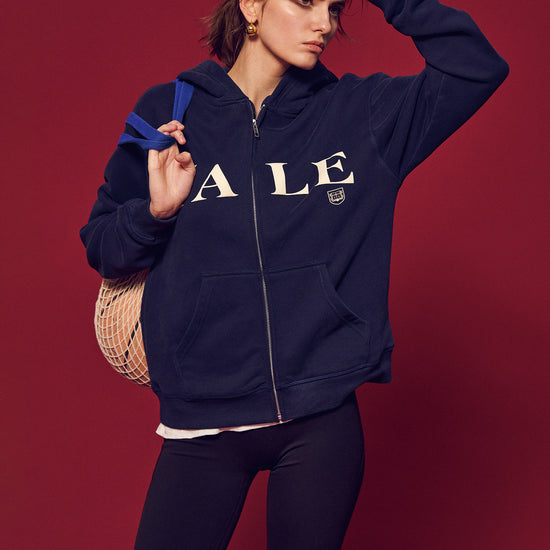 Part of The Ivy Archive. Layer up in true 90s preppy style with our Yale Navy zip-up hoodie, featuring classic collegiate embroidery and a comfortable relaxed fit.