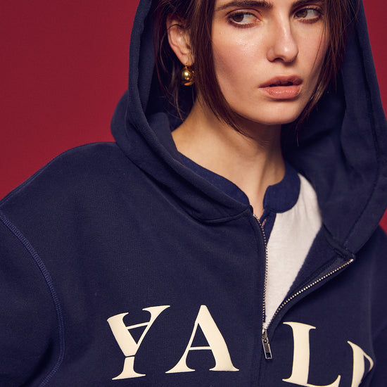 Part of The Ivy Archive. Layer up in true 90s preppy style with our Yale Navy zip-up hoodie, featuring classic collegiate embroidery and a comfortable relaxed fit.