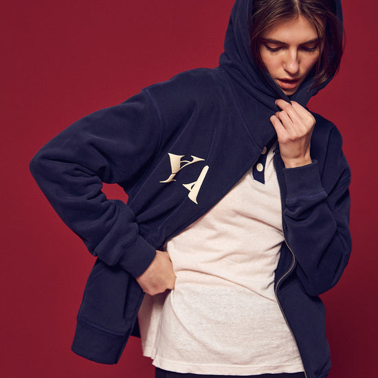 Part of The Ivy Archive. Layer up in true 90s preppy style with our Yale Navy zip-up hoodie, featuring classic collegiate embroidery and a comfortable relaxed fit.