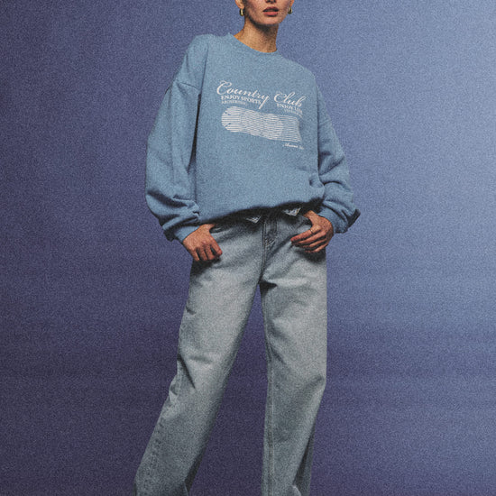 Arosris vintage white lightweight graphic training top crafted from breathable semi-sheer fabric, featuring a retro tennis sport graphic, elegantly styled for an effortless 90s sporty rich and off-duty athletic aesthetic.