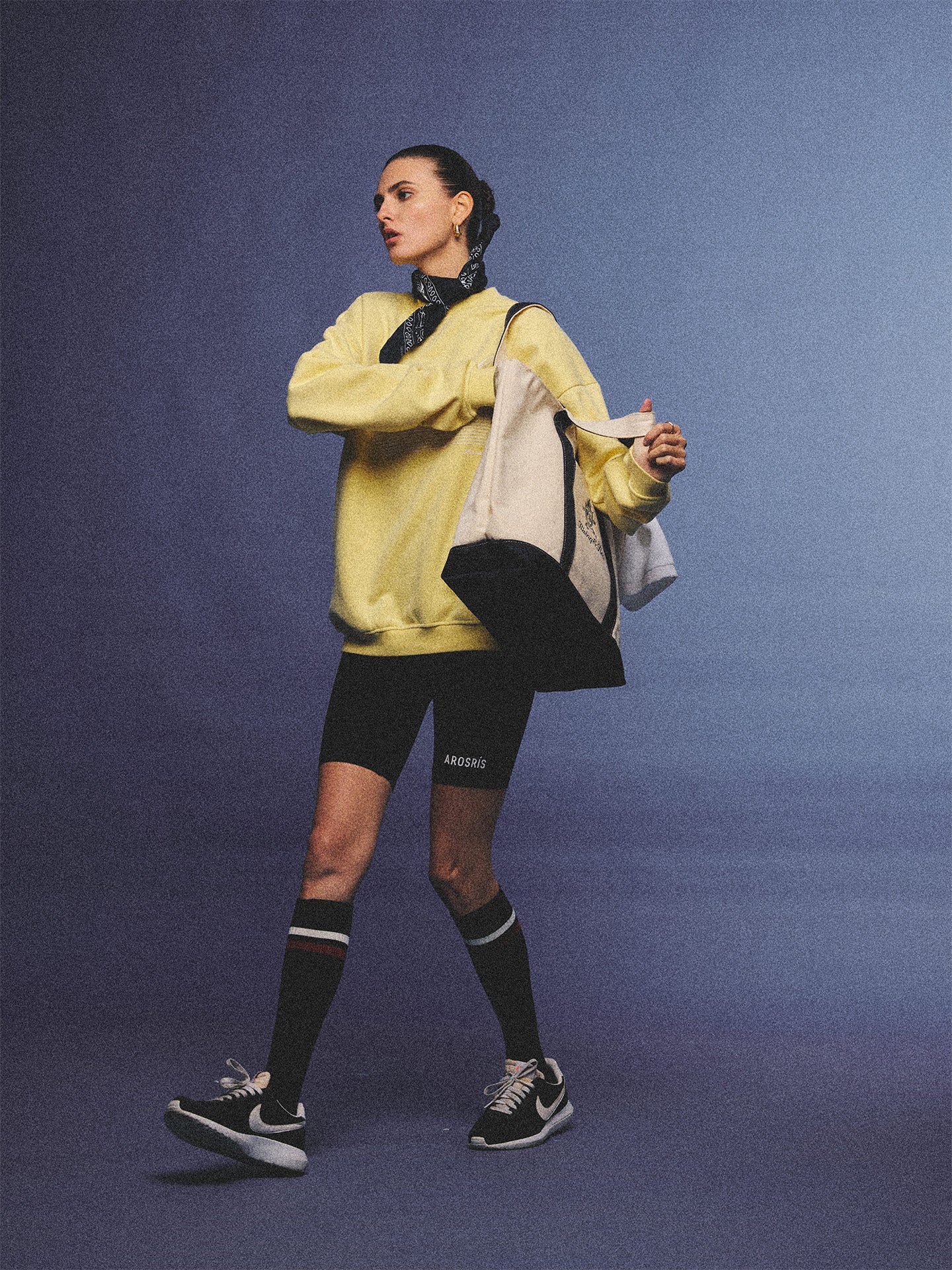 Arosris vintage white lightweight graphic training top crafted from breathable semi-sheer fabric, featuring a retro tennis sport graphic, elegantly styled for an effortless 90s sporty rich and off-duty athletic aesthetic.