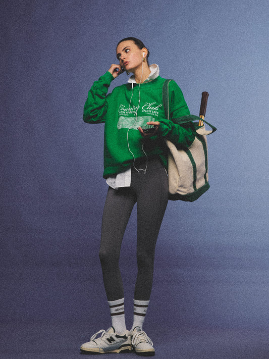 Arosris vintage white lightweight graphic training top crafted from breathable semi-sheer fabric, featuring a retro tennis sport graphic, elegantly styled for an effortless 90s sporty rich and off-duty athletic aesthetic.