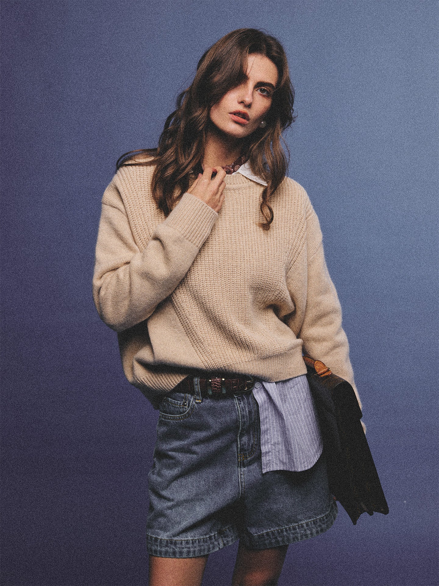 Arosris greige modern chic cashmere chunky knit sweater elegantly styled on a model over a crisp collared shirt, channeling an old money and quiet luxury aesthetic.