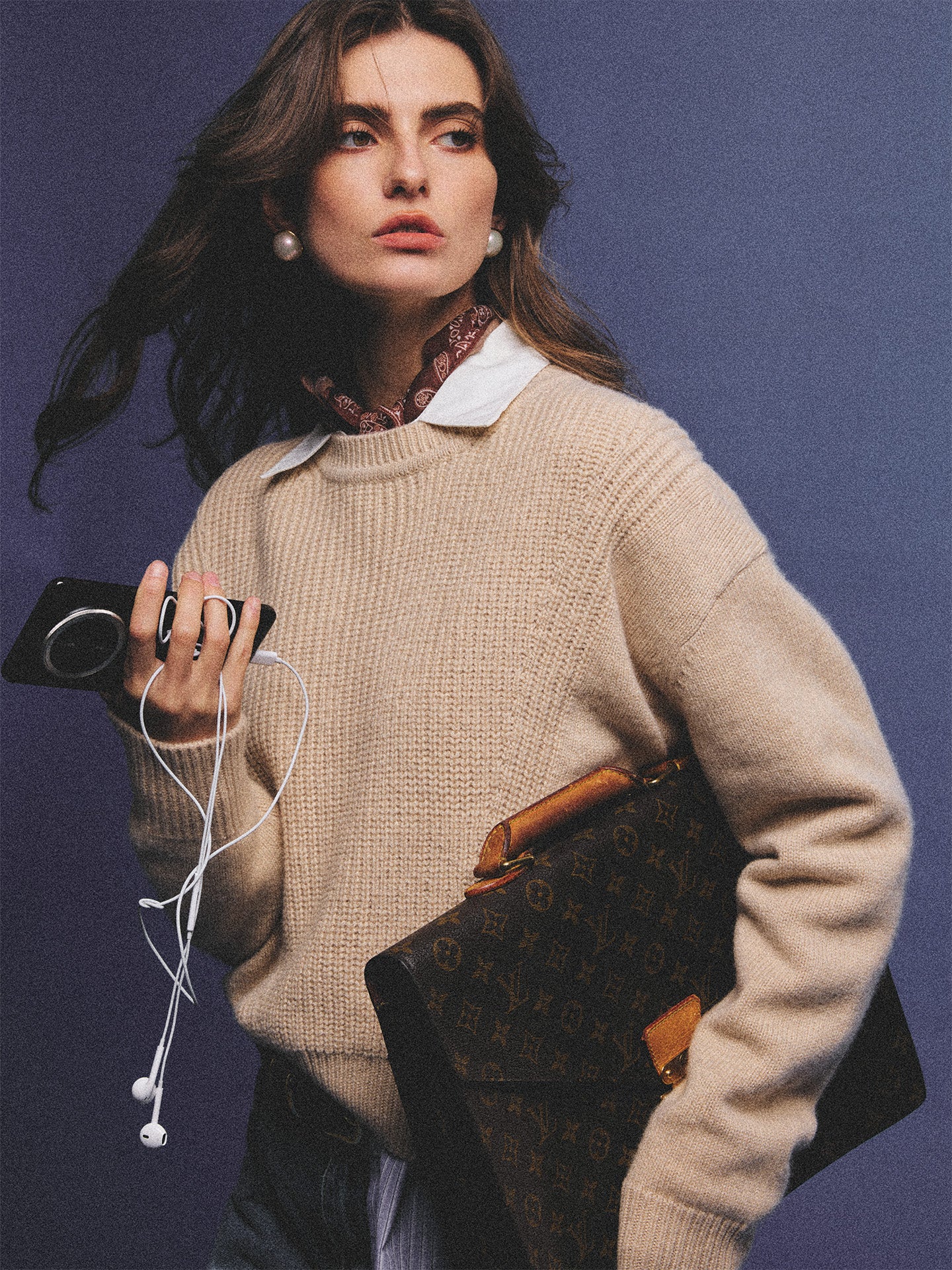 Arosris greige modern chic cashmere chunky knit sweater elegantly styled on a model over a crisp collared shirt, channeling an old money and quiet luxury aesthetic.