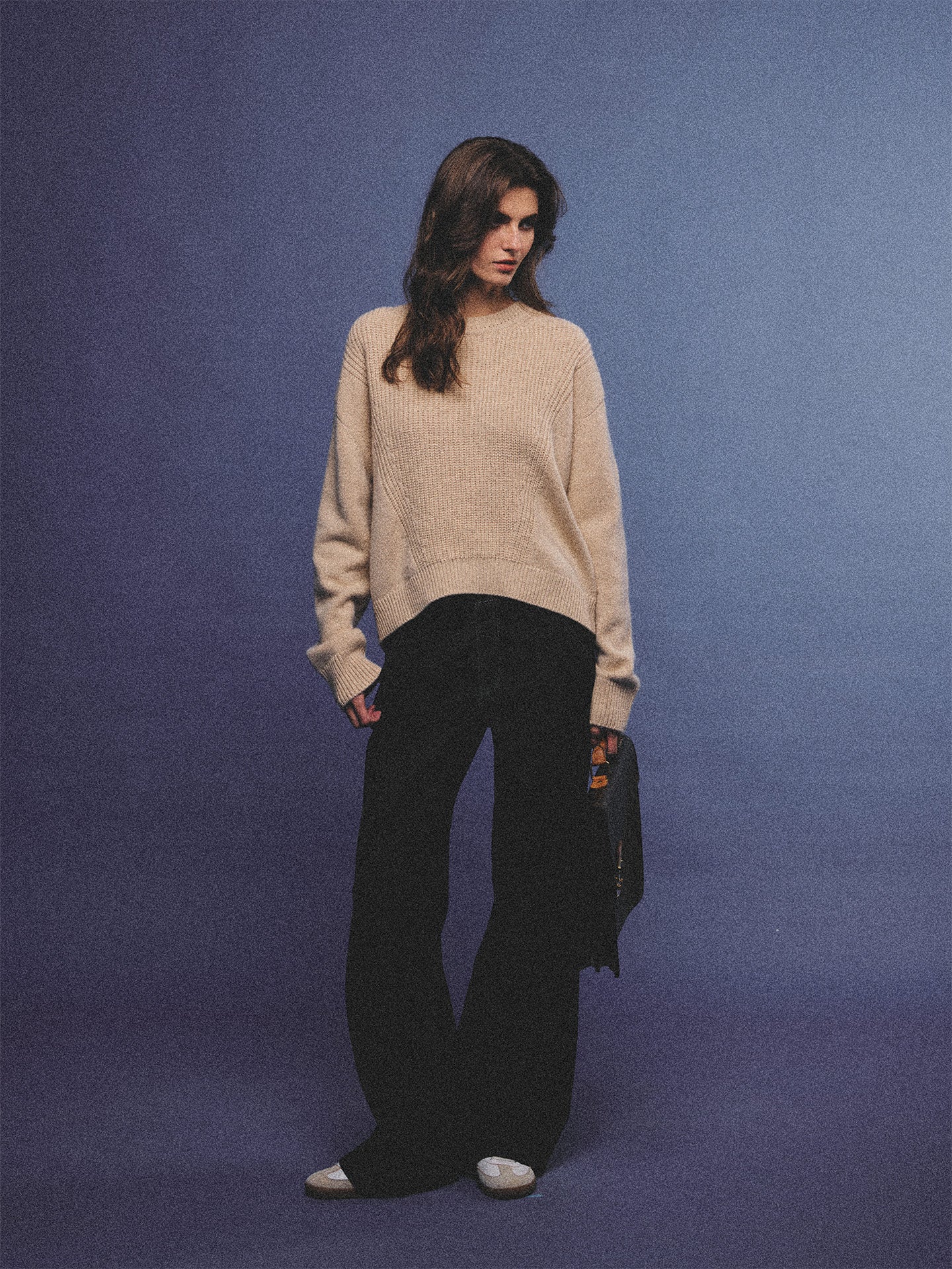 Arosris greige modern chic cashmere chunky knit sweater elegantly styled on a model over a crisp collared shirt, channeling an old money and quiet luxury aesthetic.