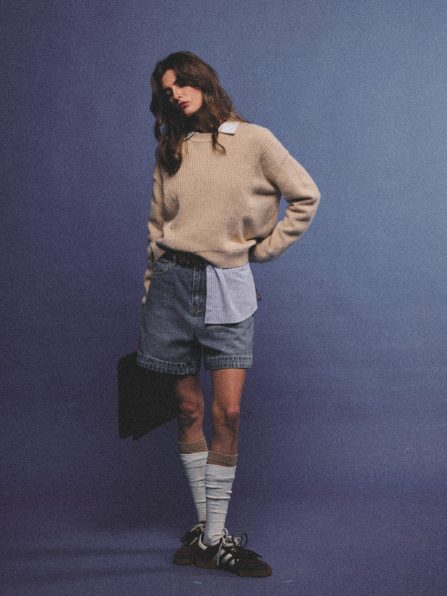 Arosris greige modern chic cashmere chunky knit sweater elegantly styled on a model over a crisp collared shirt, channeling an old money and quiet luxury aesthetic.