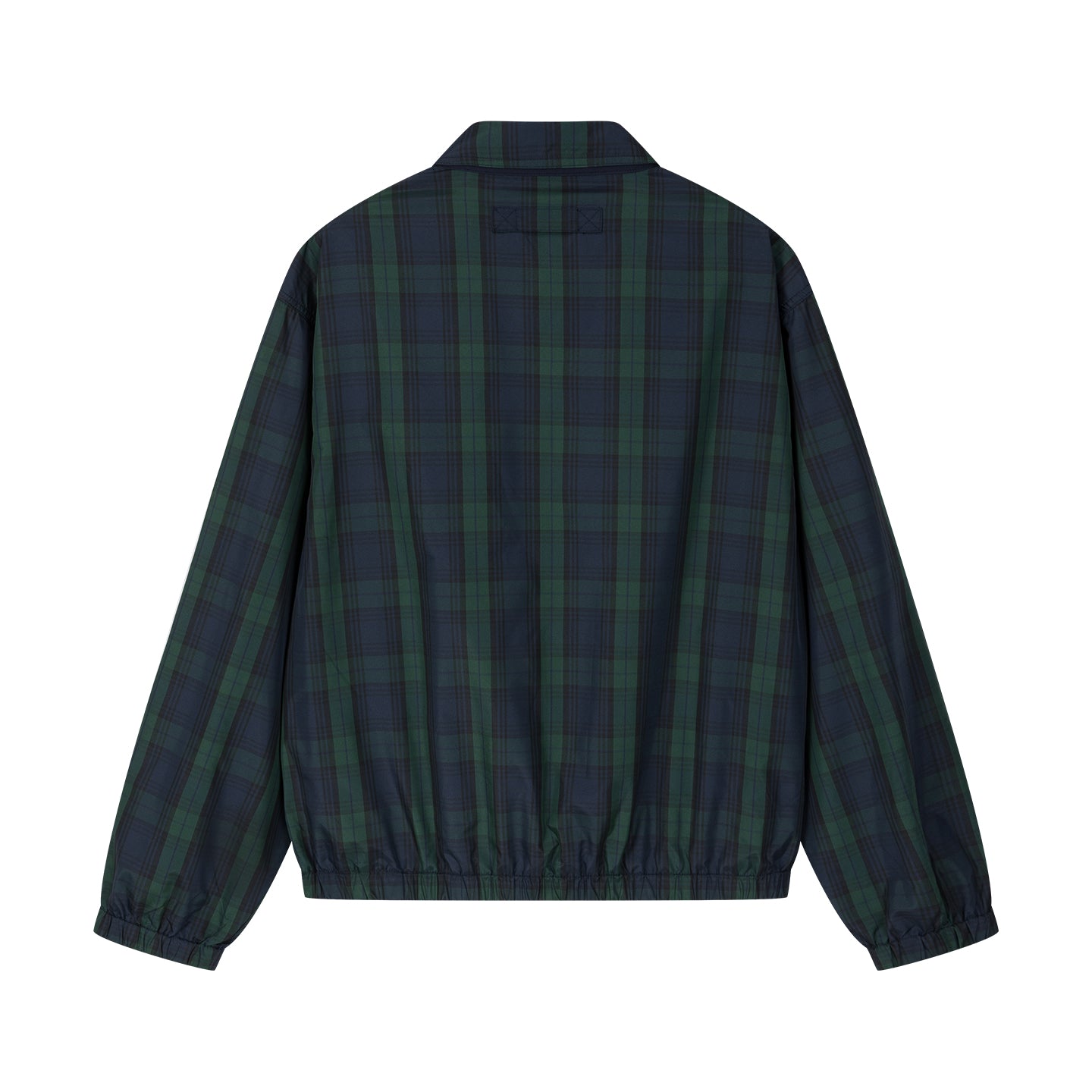 Arosris offshore Harrington jacket in classic navy and green Blackwatch tartan, styled with wide-leg jeans for a 90s vintage nautical look.