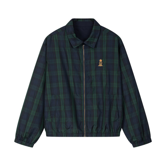 Arosris offshore Harrington jacket in classic navy and green Blackwatch tartan, styled with wide-leg jeans for a 90s vintage nautical look.