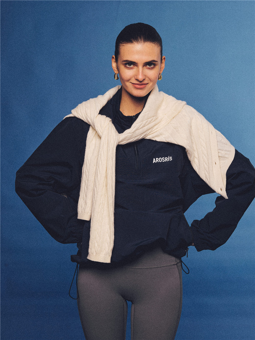 Arosris navy retro sport half-zip windproof jacket, styled with athletic leggings and layered accessories for an effortless 90s sporty-chic country club aesthetic.