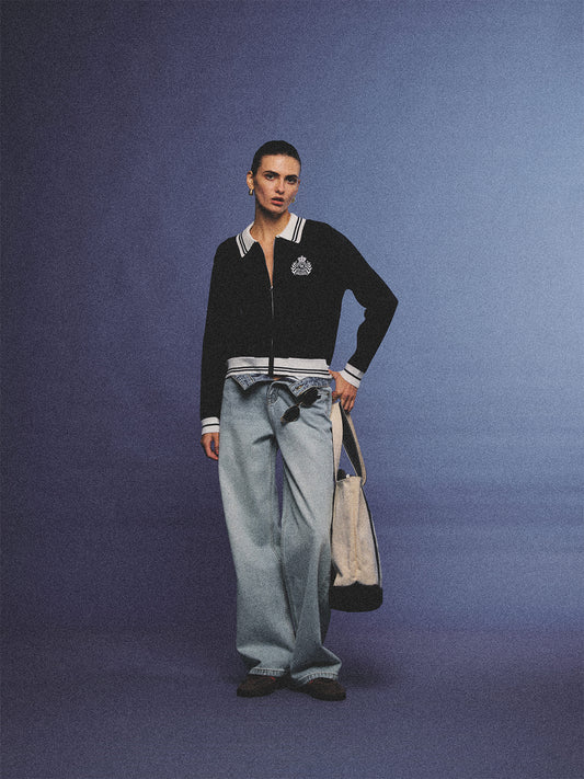 Arosris royal sapphire blue retro zip-up polo knit featuring a contrast tipped collar and vintage tennis club crest, elegantly styled for an effortless 90s old money tenniscore aesthetic.
