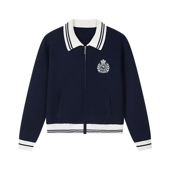 Arosris royal sapphire blue retro zip-up polo knit displayed in flat lay views, highlighting the contrast tipped collar, retro ring-pull half-zip, vintage crest embroidery, and flattering cropped silhouette.