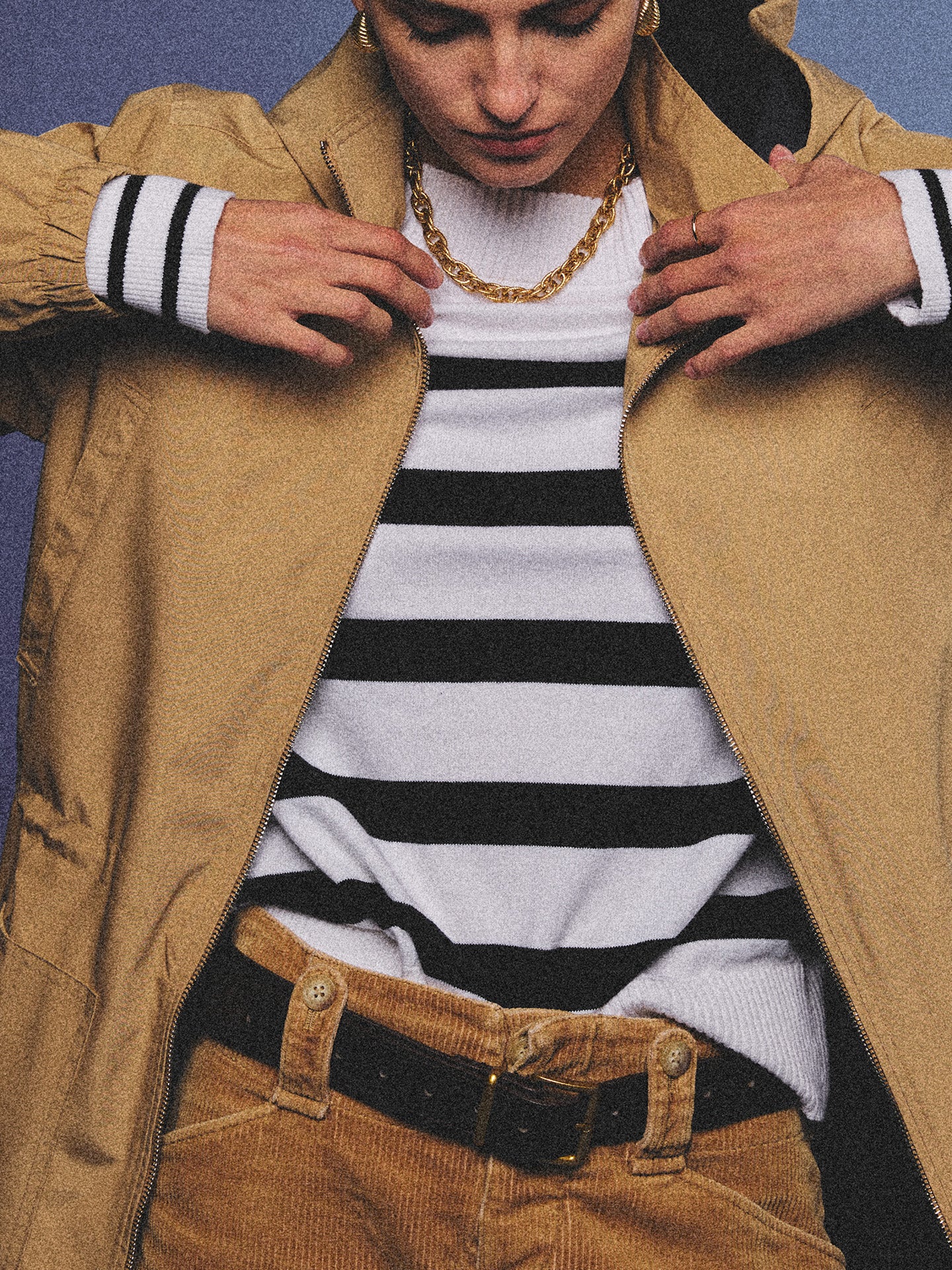 Arosris Riviera navy striped boat neck sweater elegantly styled on a model with corduroy shorts and vintage accessories, capturing an effortless 90s old money coastal resort aesthetic.