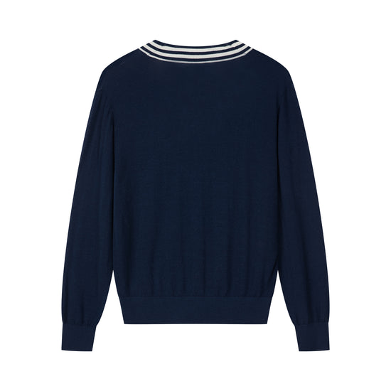 osris deep sapphire tennis club v-neck sweater displayed in product flat lay views, showcasing the classic V-neckline with contrast stripes, vintage crest embroidery, and premium seamless sheep wool knit.