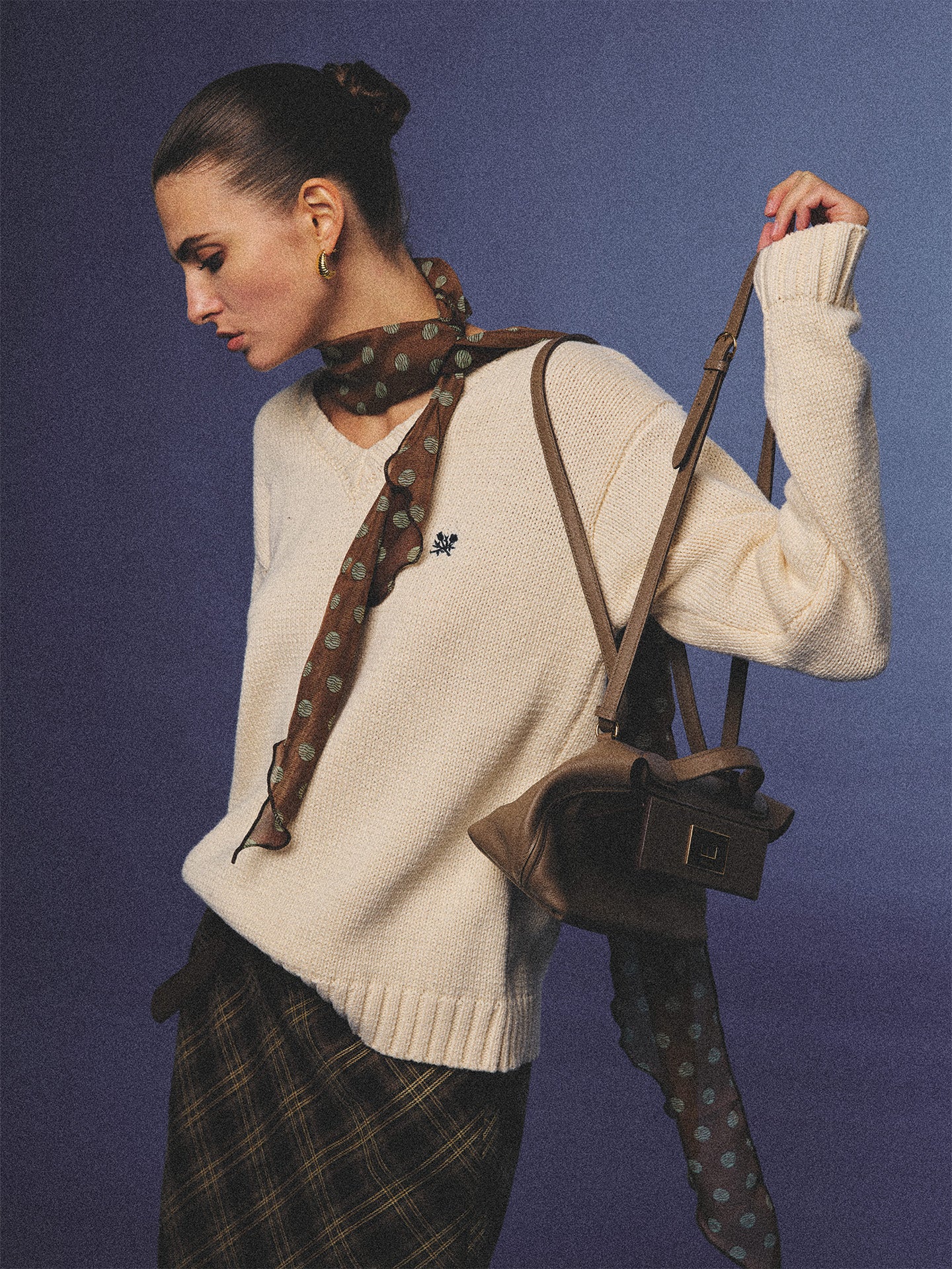 Arosris creamy khaki v-neck embroidered sweater, elegantly styled with a vintage silk scarf and plaid skirt for an effortless 90s old money aesthetic.