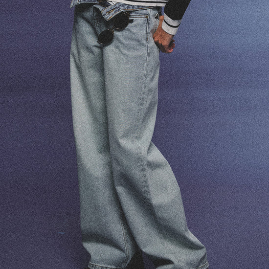 Arosris light wash high-rise wide leg denim jeans styled on a model in various poses, showcasing the structured 100% rigid cotton fit and an effortless 90s-inspired off-duty aesthetic.