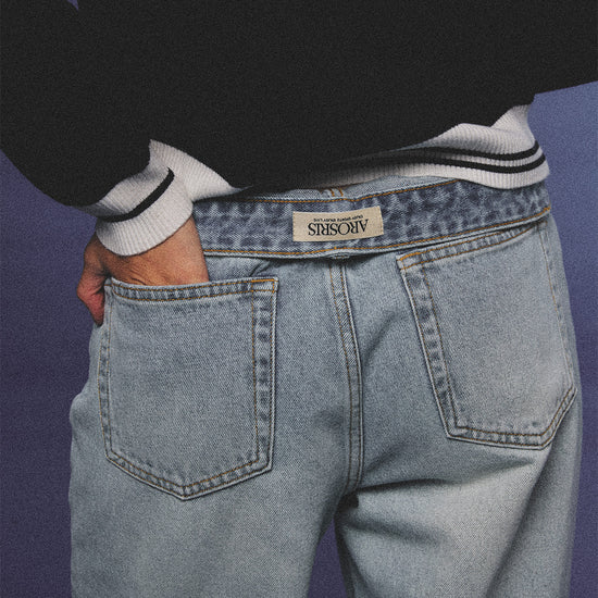 Arosris light wash high-rise wide leg denim jeans styled on a model in various poses, showcasing the structured 100% rigid cotton fit and an effortless 90s-inspired off-duty aesthetic.