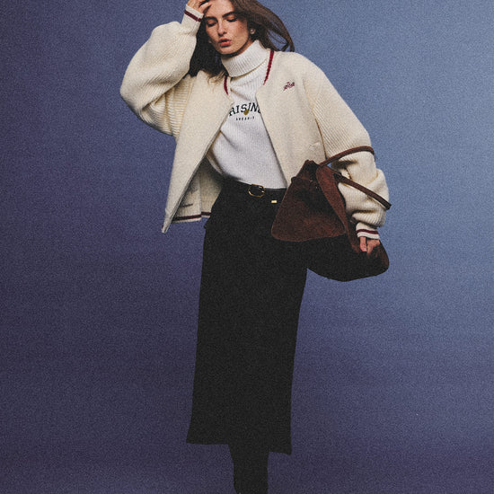 Arosris retro campus white wool varsity zip cardigan, elegantly styled with a knit turtleneck and suede accessories for an effortless 90s old money preppy aesthetic.