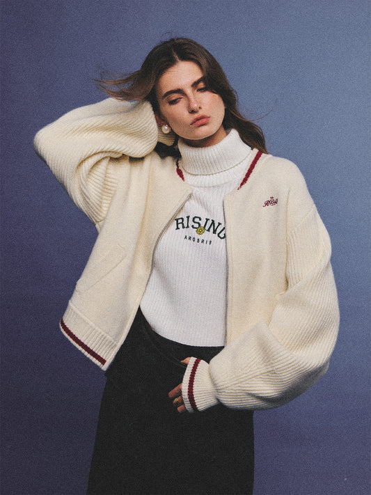 Arosris retro campus white wool varsity zip cardigan, elegantly styled with a knit turtleneck and suede accessories for an effortless 90s old money preppy aesthetic.
